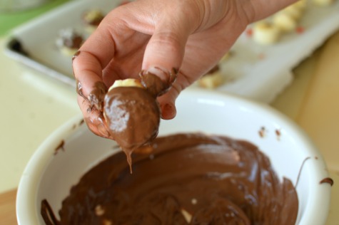 Cover sliced bananas with chocolate, sprinkle with toppings and freeze. Perfect after school snack!