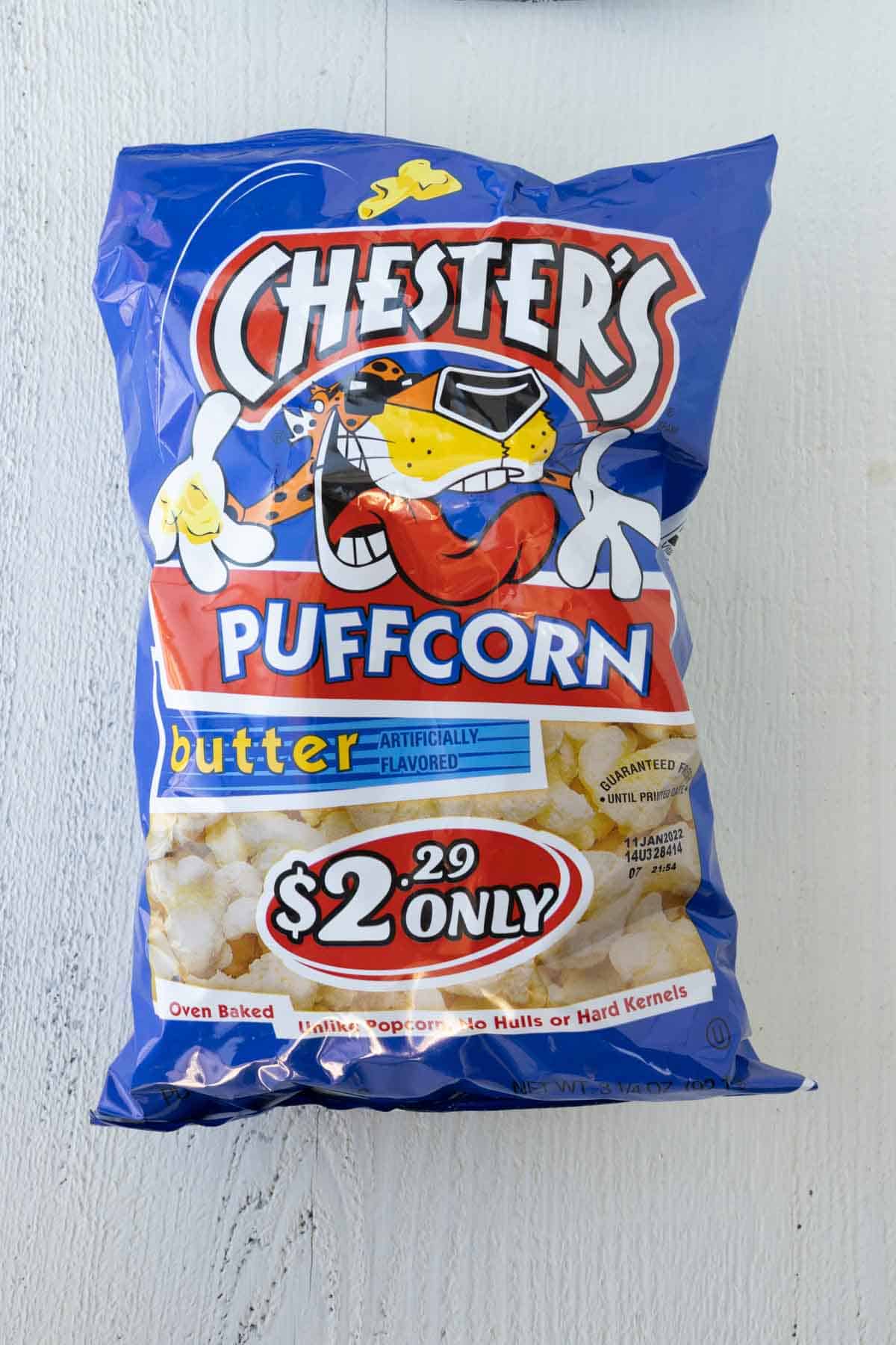 A bag of butter flavored Chesters puffcorn.