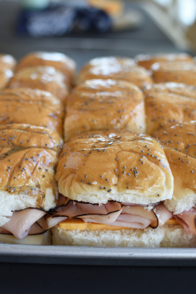 image showing how to make hot ham and cheese in the oven with rolls 