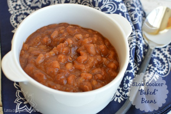 Baked beans made in the slow cooker with a tomato sauce and crumbled bacon