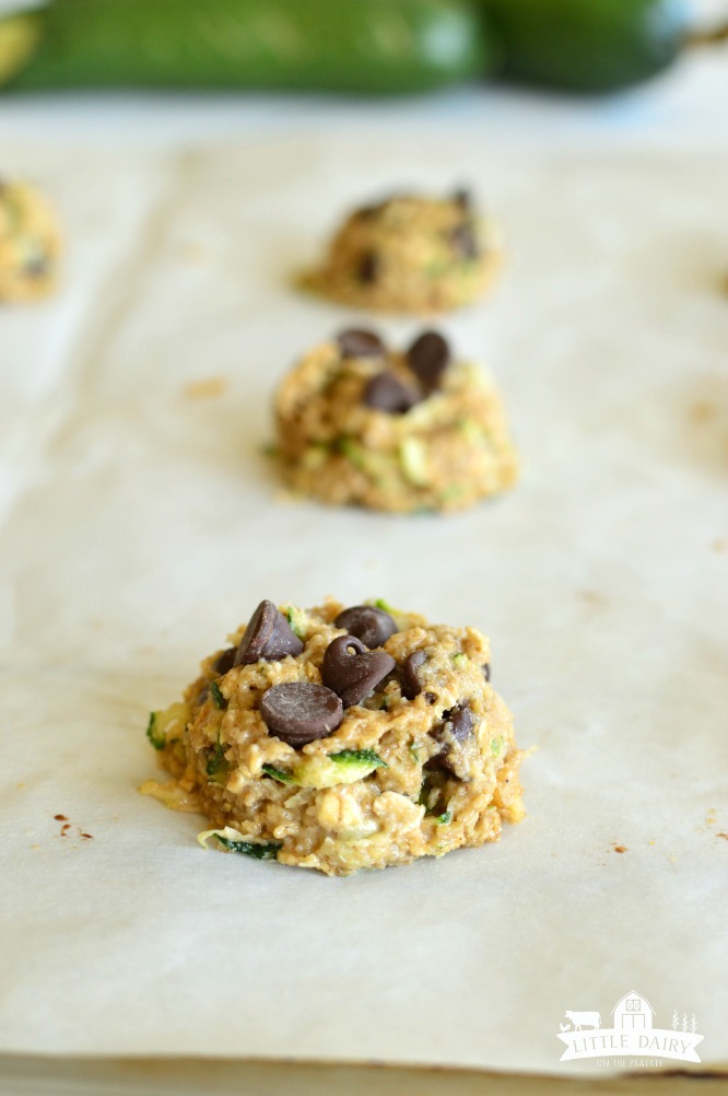 3 raw zucchini Cookies on a cookie sheet