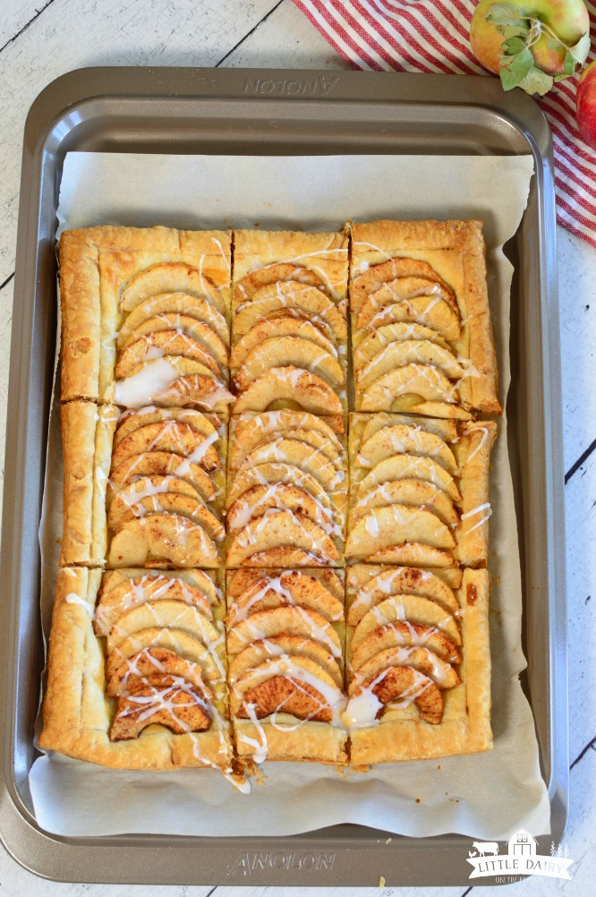 Simple Puff Pastry Apple Tart has sliced apples, tossed in a sugar mixture, placed on top of a puff pastry. It's and easy dessert! pitchforkfoodie.com #desserts #baking #dessert #apples #pie #fall #puffpastry #easyrecipe #recipe #yummy