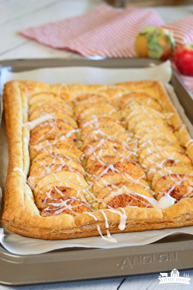 Simple Puff Pastry Apple Tart has sliced apples, tossed in a sugar mixture, placed on top of a puff pastry. It's and easy dessert! pitchforkfoodie.com