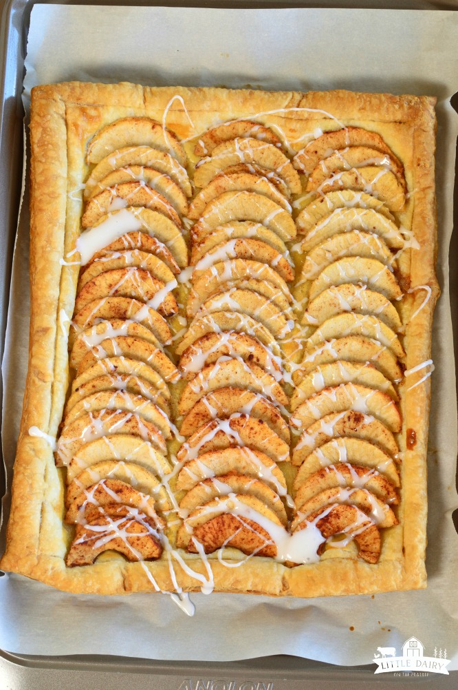 Simple Puff Pastry Apple Tart has sliced apples, tossed in a sugar mixture, placed on top of a puff pastry. It's and easy dessert! pitchforkfoodie.com #desserts #baking #dessert #apples #pie #fall #puffpastry #easyrecipe #recipe #yummy