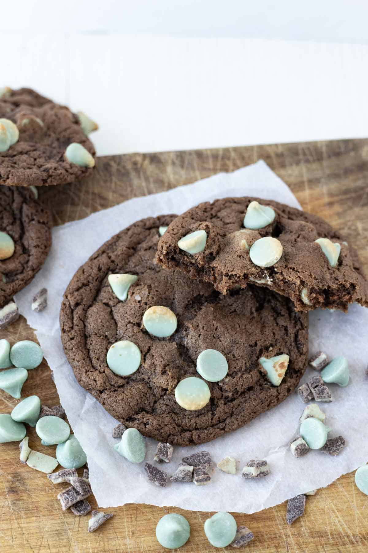 Mint chip chocolate cookies on a white piece of paper.