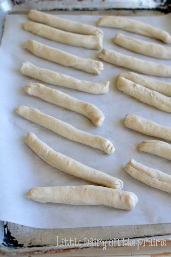 raw biscuit dough rolled into ropes