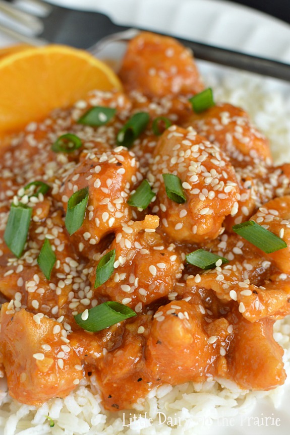 The best Slow Cooker Skinny Orange Chicken! I'm a working mom who happens to live and hour from fast food so I have to create recipes like this! So yummy!