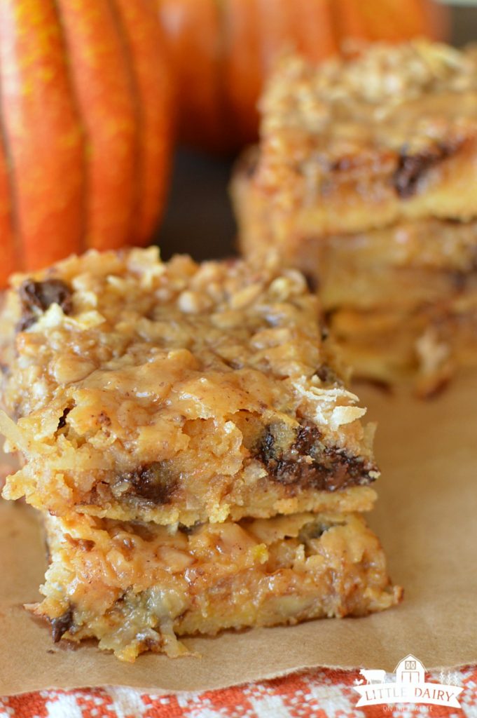 two magic bar squares with chocolate chips and pumpkin