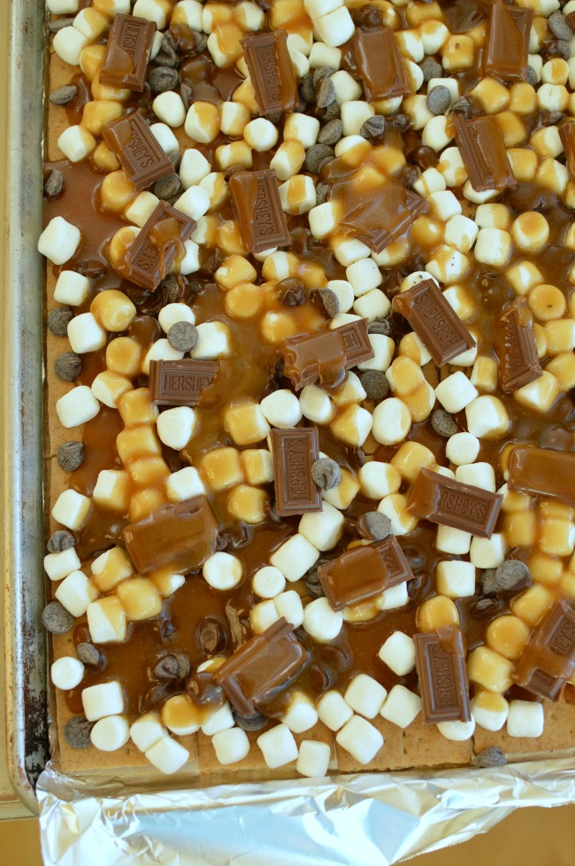 A sheet pan with unbaked smores toffee