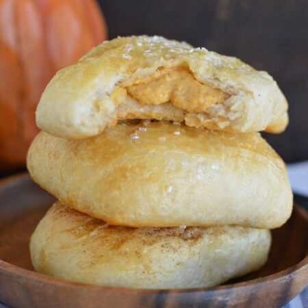 pieces of dough filled with pumpkin cream filling, a stack of three