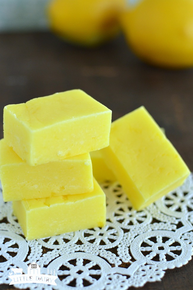 A stack of lemon fudge cut into squares.