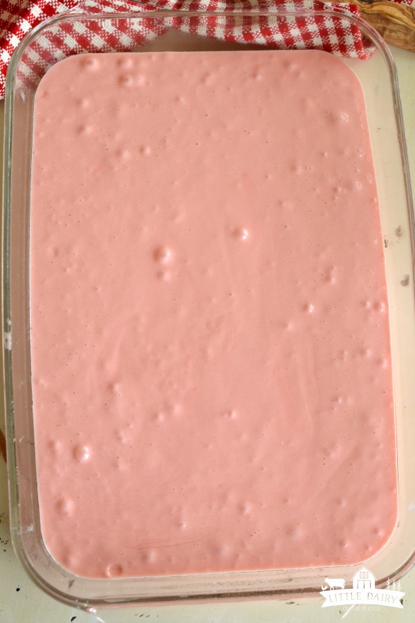 Strawberry cake batter in a pan.