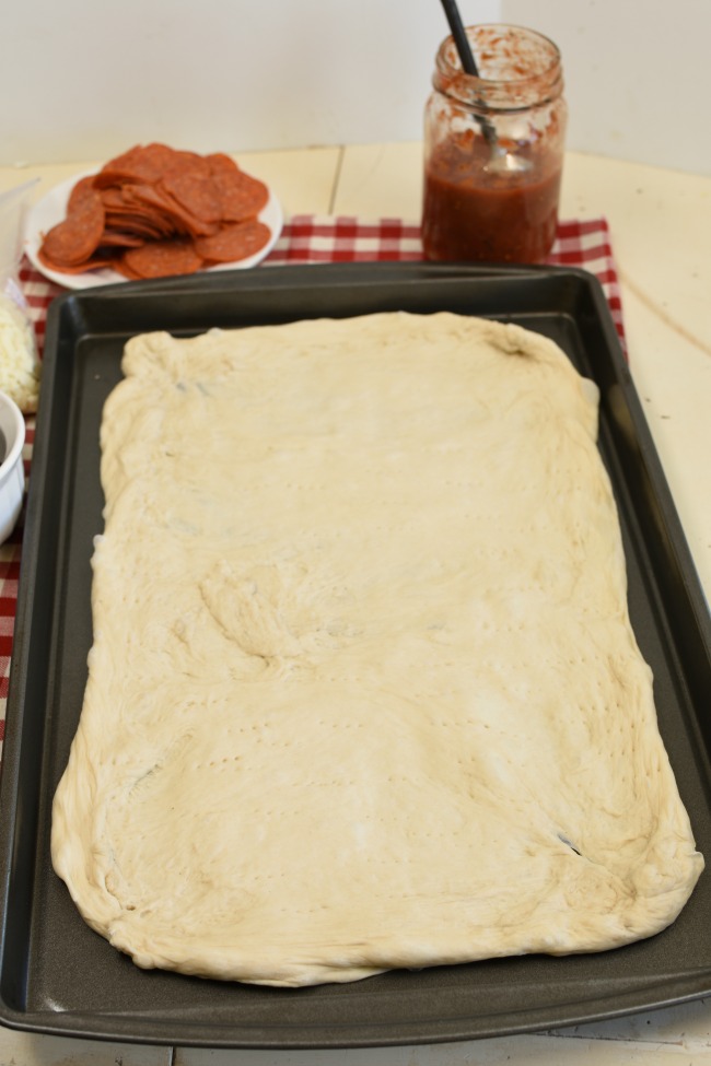 Unbaked cough in a cookie sheet.