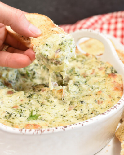 cream cheese dip with broccoli on a piece of croustini