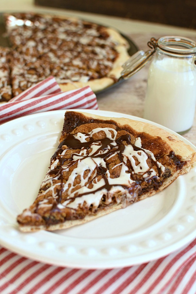 A slice of chocolate chip cookie pizza.