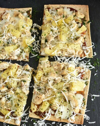 square pizza with pineapple and parmesan cheese