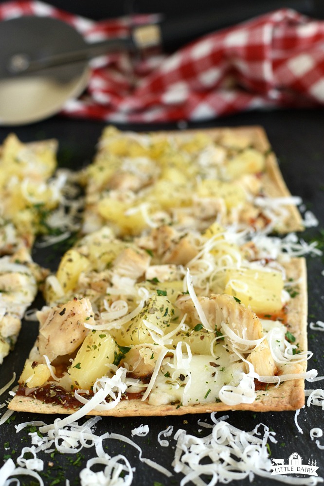 squares of baked pineapple pizza