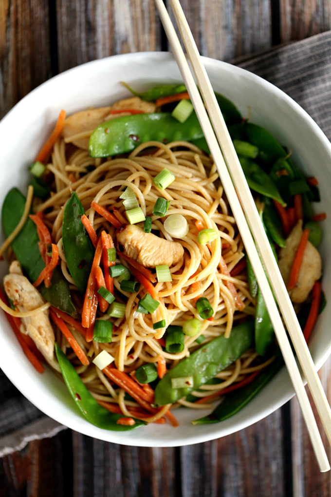 Chinese noodles, snap peas, with chopsticks