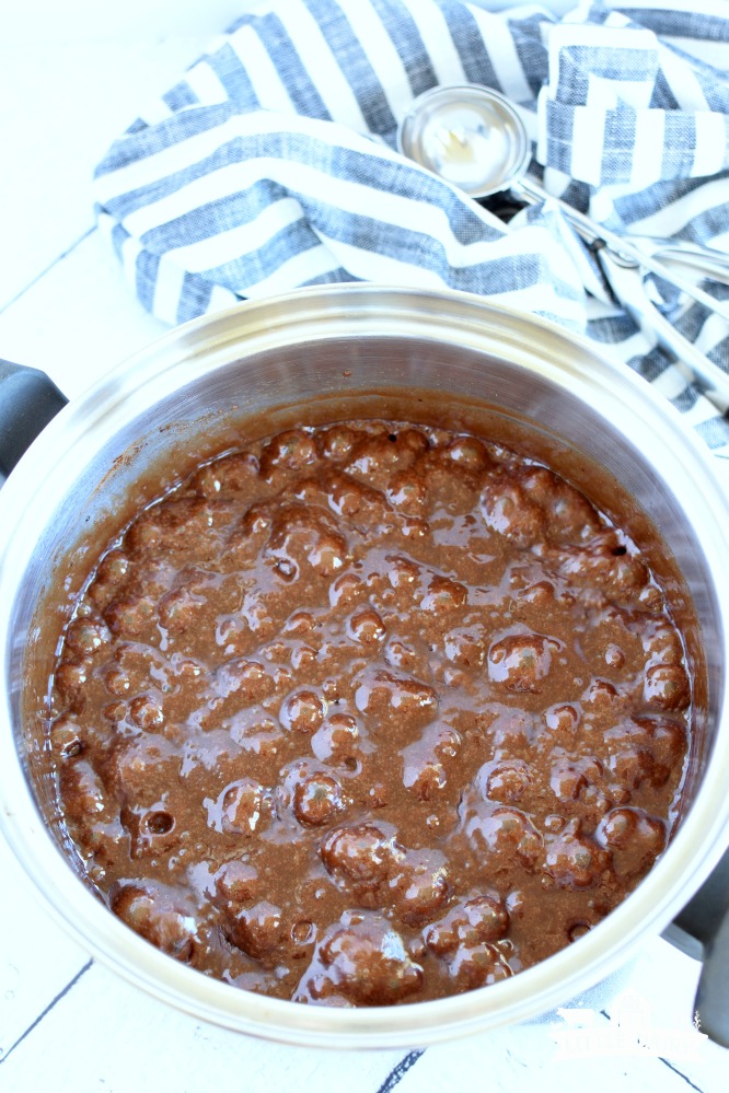 a saucepan boiling chocolate mixture showing how long to boil no bake cookies recipe