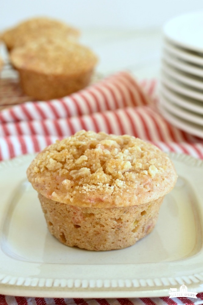 Rhubarb Cinnamon Streusel Muffins - muffin with streusel on top, on a white plate