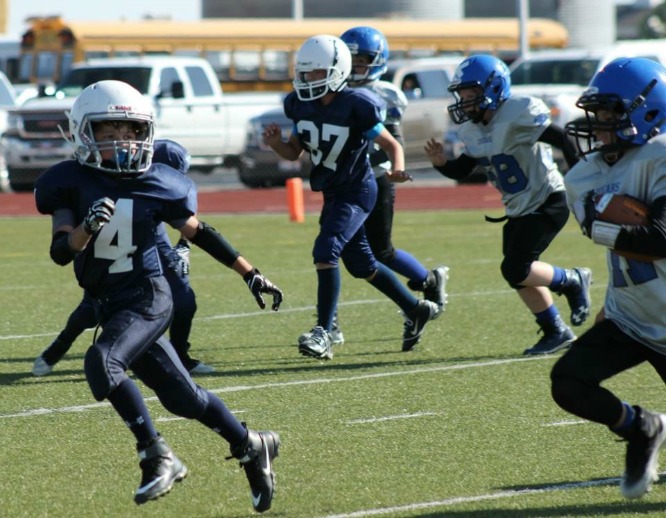 Payson Playing football