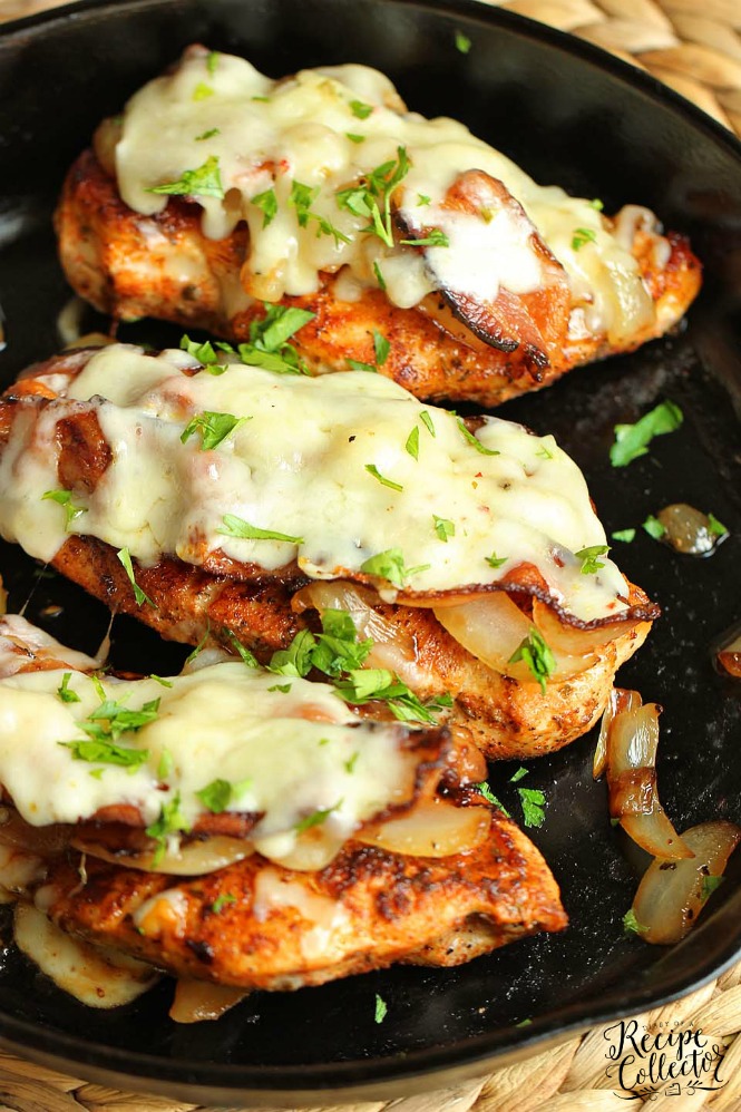 a black pan with pepperjack cheese melted on blackened chicken breasts