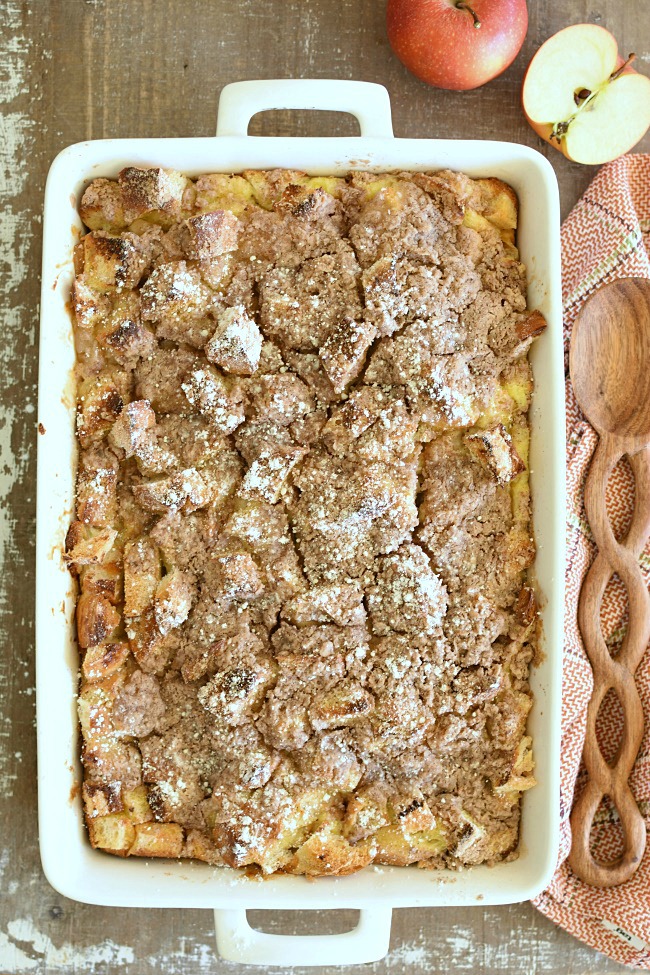 A white pan with baked apple pie french toast