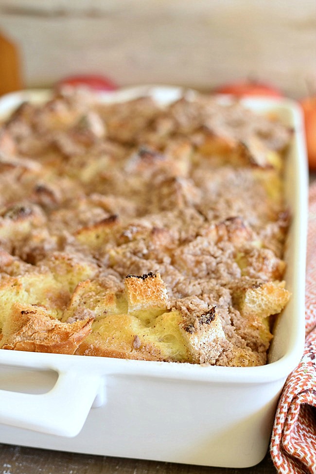 close up shot of baked apple pie French Toast in a baking dish