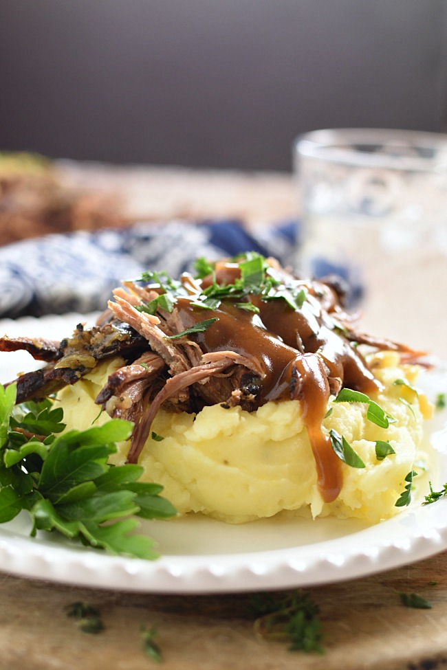 mashed potatoes with shredded roast beef and gravy