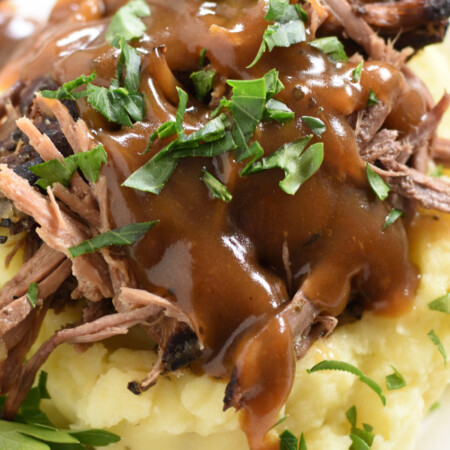 mashed potatoes and shredded roast beef with chopped parsley