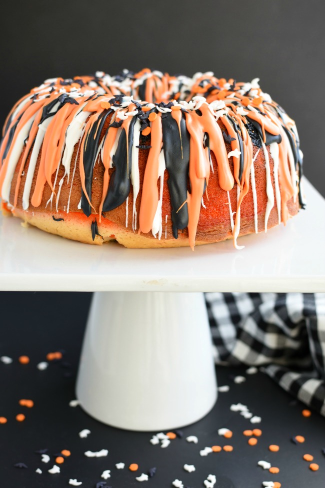 Black, orange, and white iced Halloween bundt cake