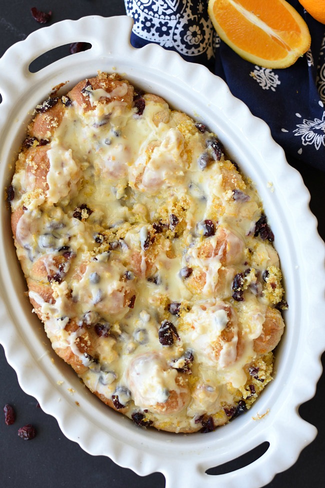 Baked orange monkey bread with orange glaze and dried cranberries