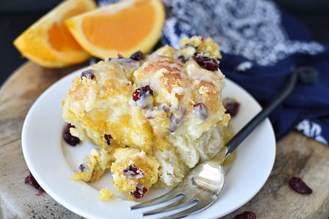 top view of baked, orange glazed monkey bread with cranberries