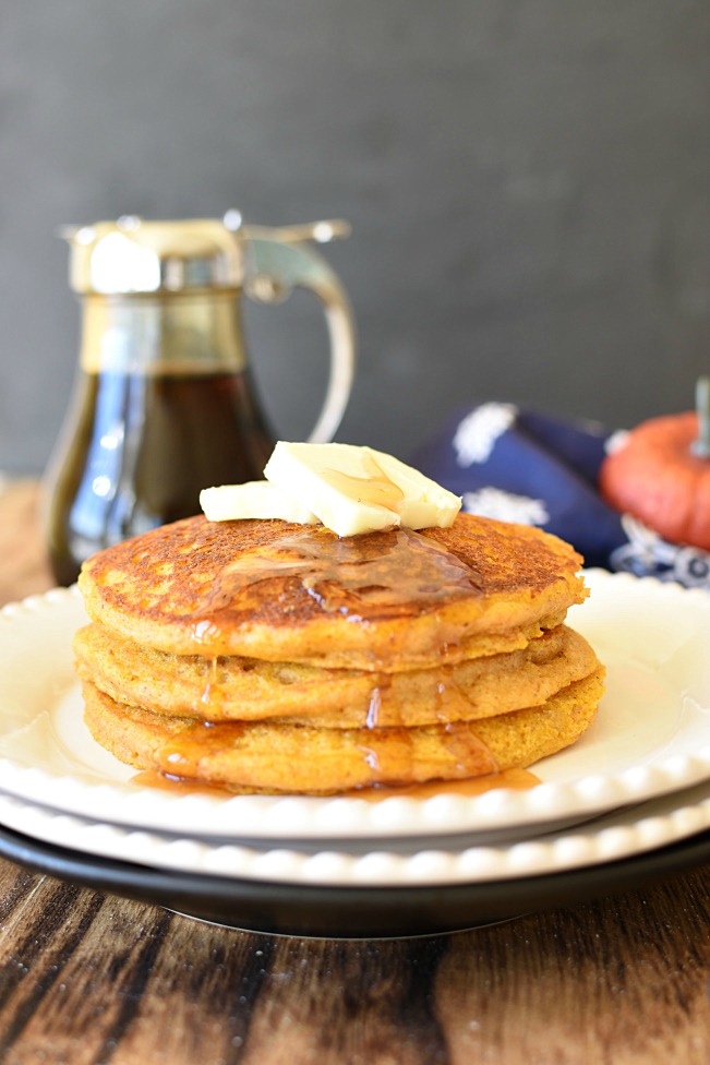 Whole Wheat Pumpkin Pancakes with butter on top