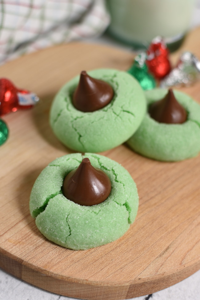 green cookies with chocolate kisses in therm