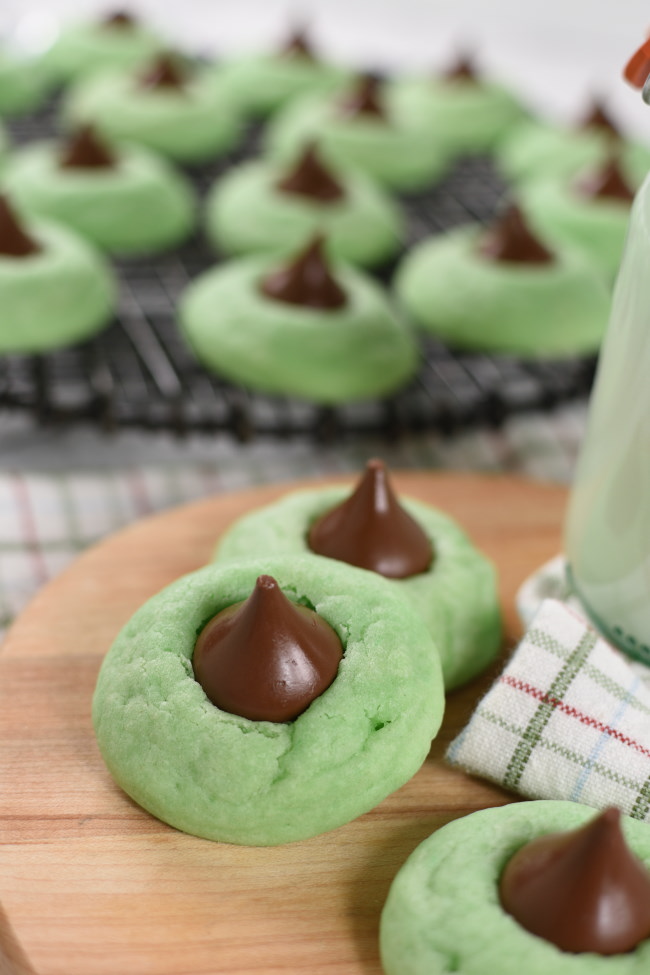 green cookies with chocolate kisses in therm
