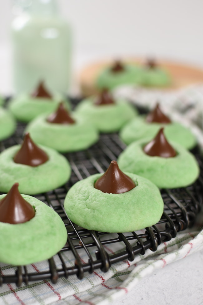 green mint cookies on a cooling rack