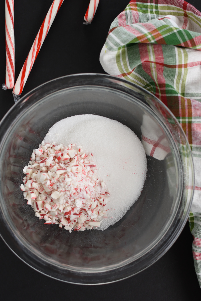 Bowl of granulated sugar and crushed candy canes