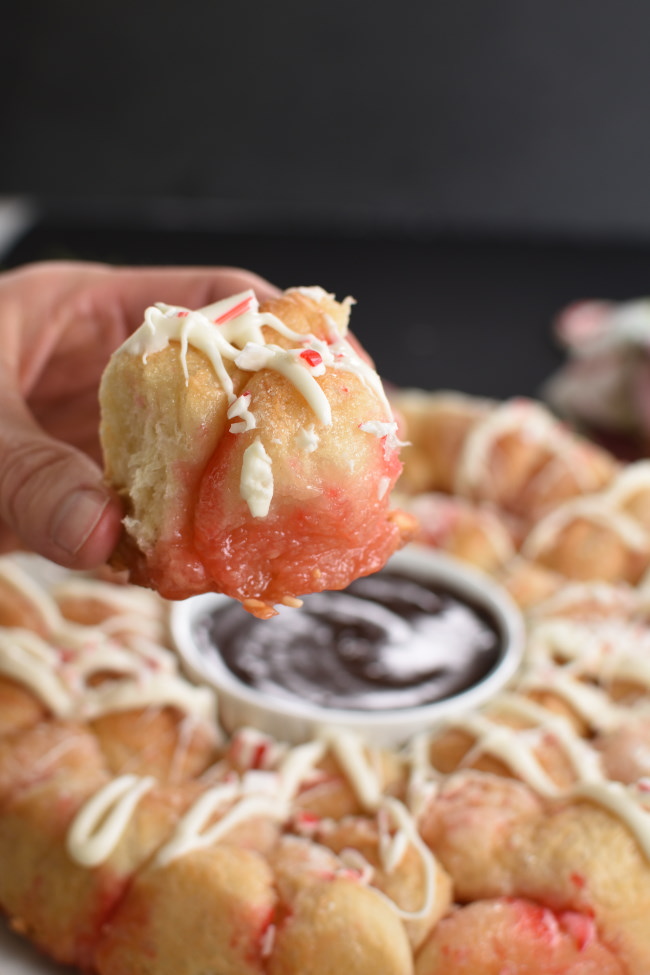 a bite of pull apart with icing and crushed candy canes