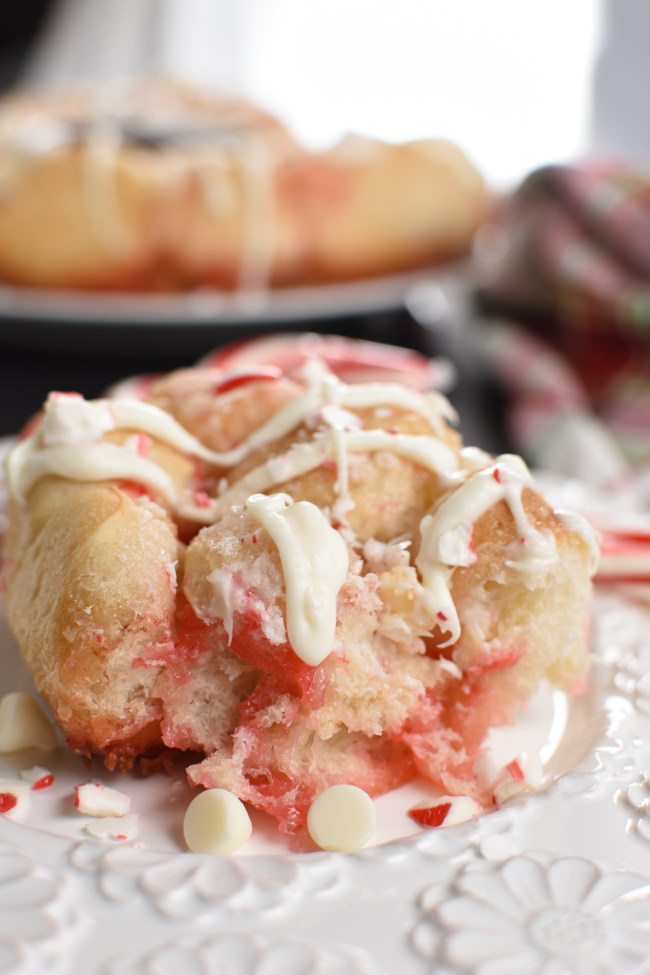 baked peppermint bark monkey bread on a plate