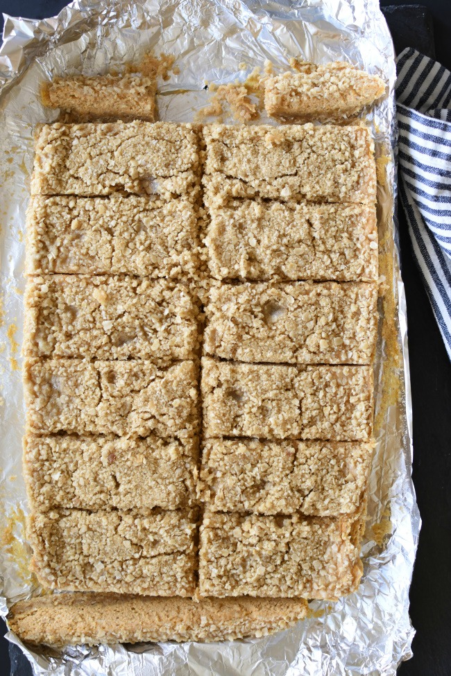 Pumpkin Cheesecake Crumb Bars cut into squares