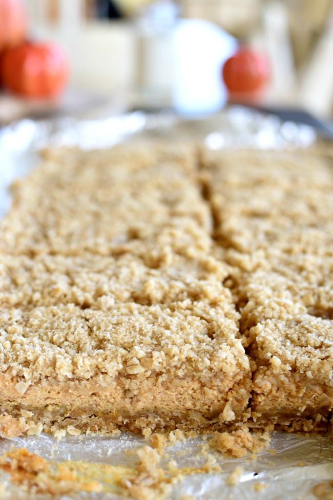 Pumpkin Cheesecake Crumb Bars cut into squares