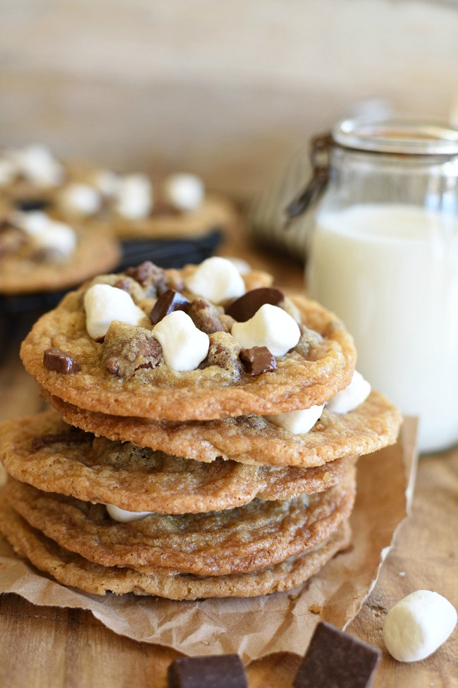 Stack of baked s'mores cookies and milk