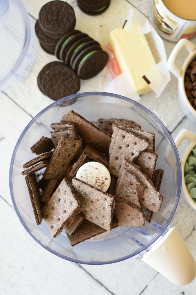 food processor with chocolate graham crackers in it