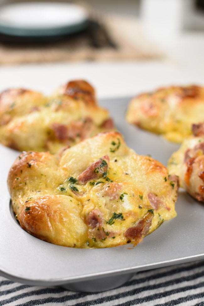 baked breakfast monkey bread in a jumbo muffin tin