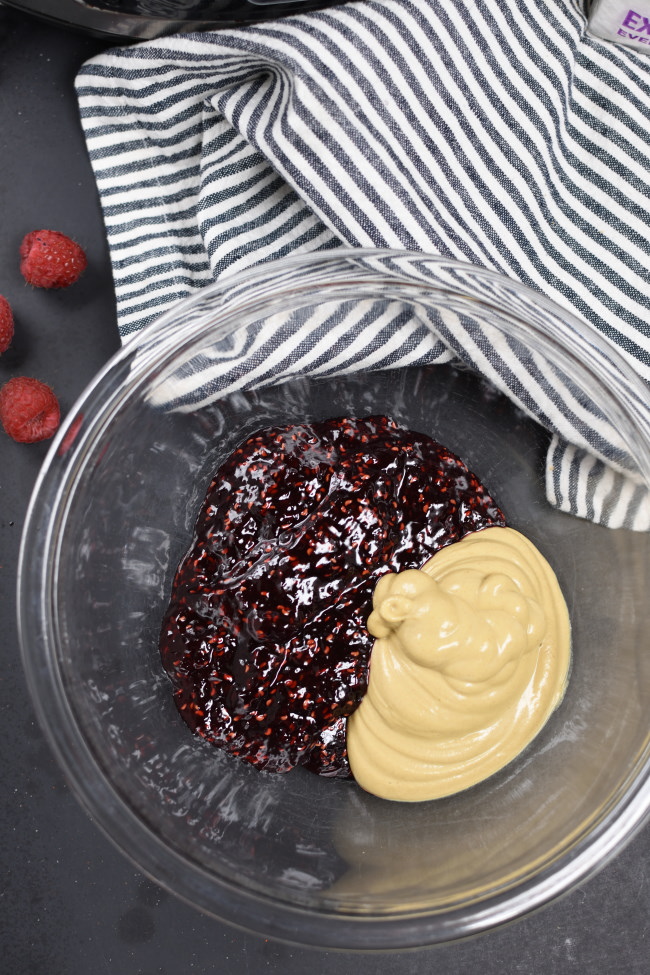 raspberry jam and dijon mustard in a bowl