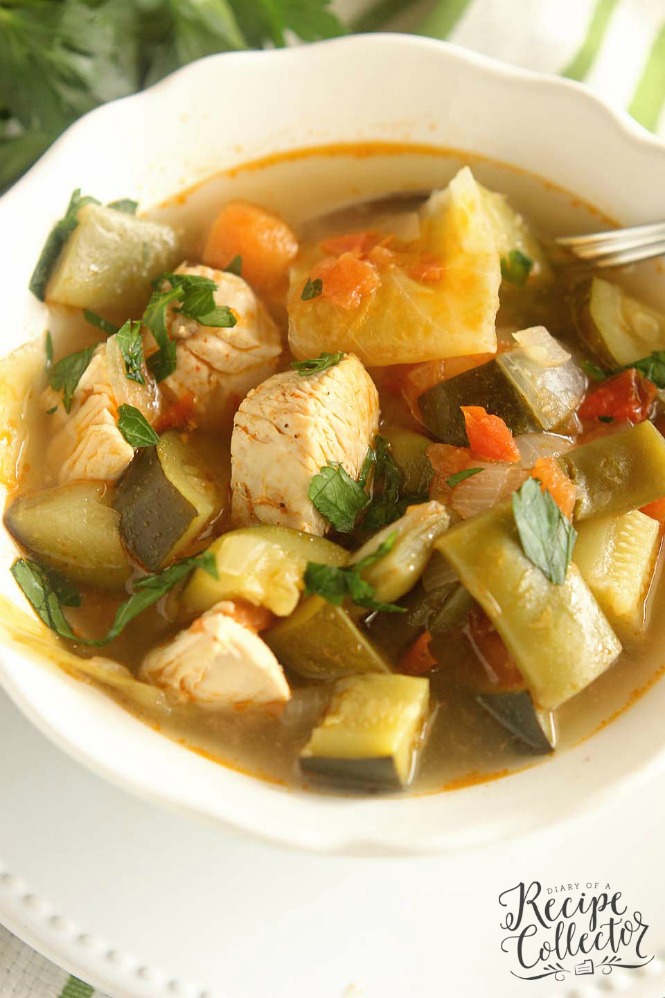a bowl of chicken soup with vegetables
