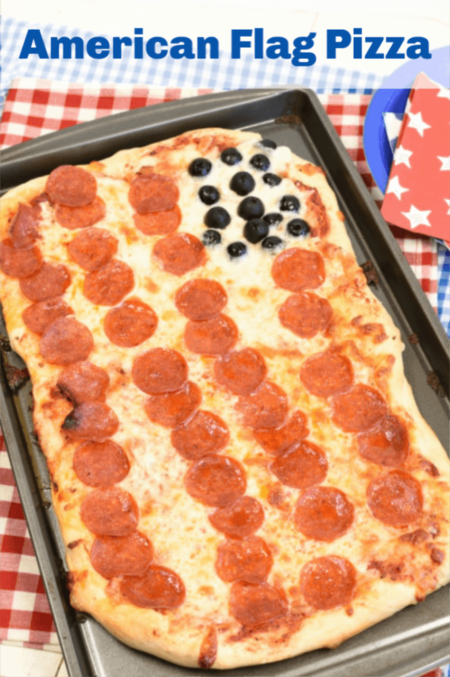 a sheet pan with decorated as an American flag with pepperoni and olives
