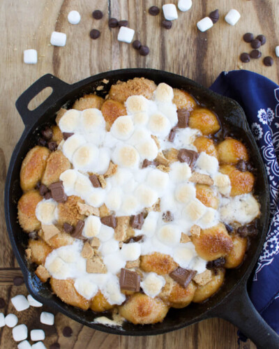 golden brown baked monkey bread topped with melted marshmallows