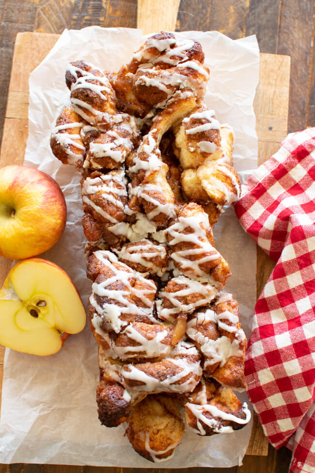 stressel topped apple pull apart bread on a bread board